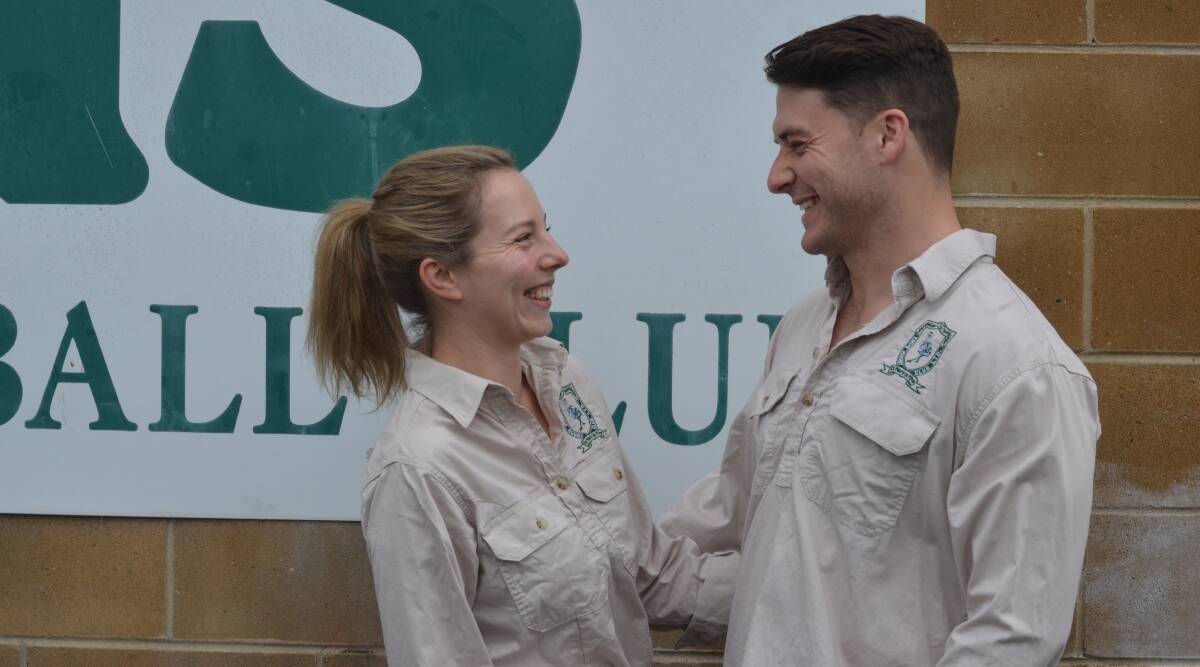 Ellen Sainty and Harry Cummins share a moment at their second home, Emus rugby club. Picture by Dominic Unwin