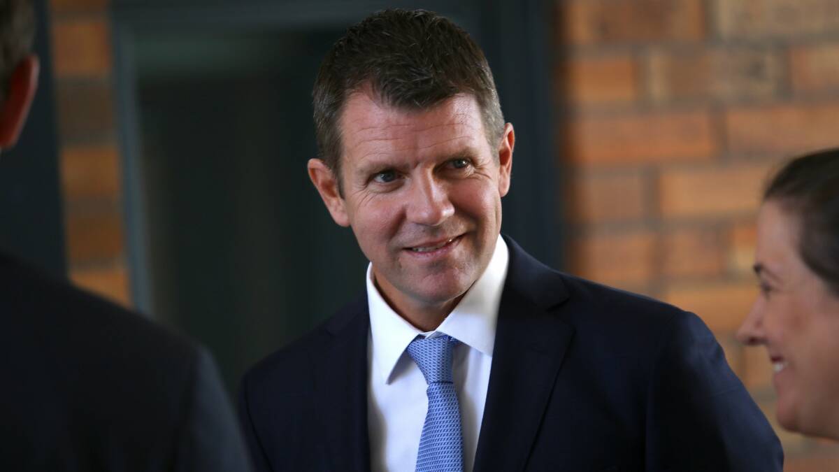 Former NSW Premier Mike Baird after announcing a before-and-after school care policy in 2016. Picture John Veage