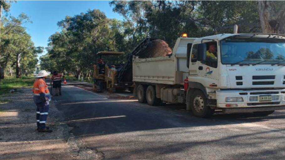 Asphalting works being completed on Corridgery Road. Picture Forbes Shire Council