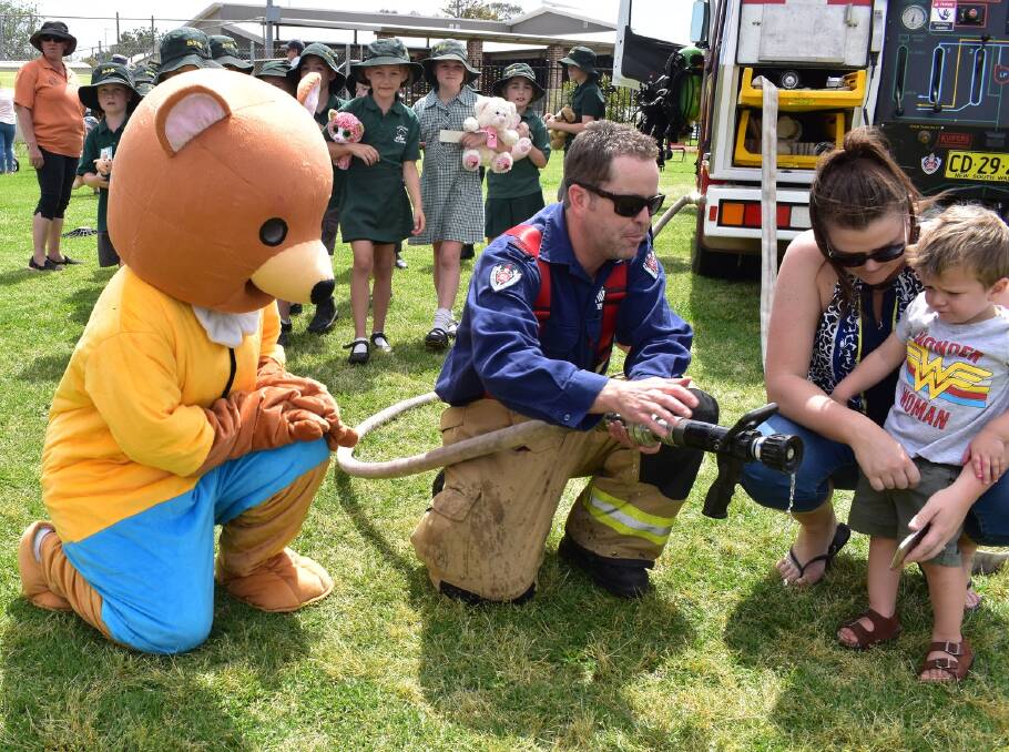 Big Ted and fireman Mat are ready for another Teddy Bear's Picnic. Picture by Forbes Shire Council