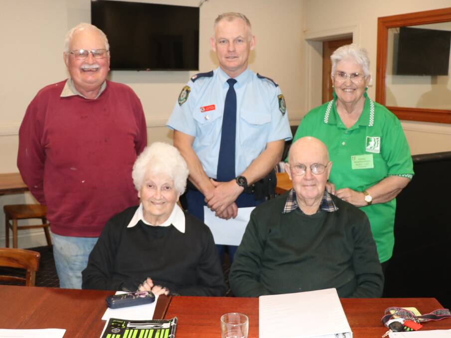 Chief Inspector Adam Beard with Bruce Adams, Lyn Ward (front) Pam and Allan Toole. 