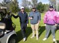 Ready for golf : Marcus Inder, Nick Inder and Kailab Tyne are prepared for their game as they await their fourth member.
